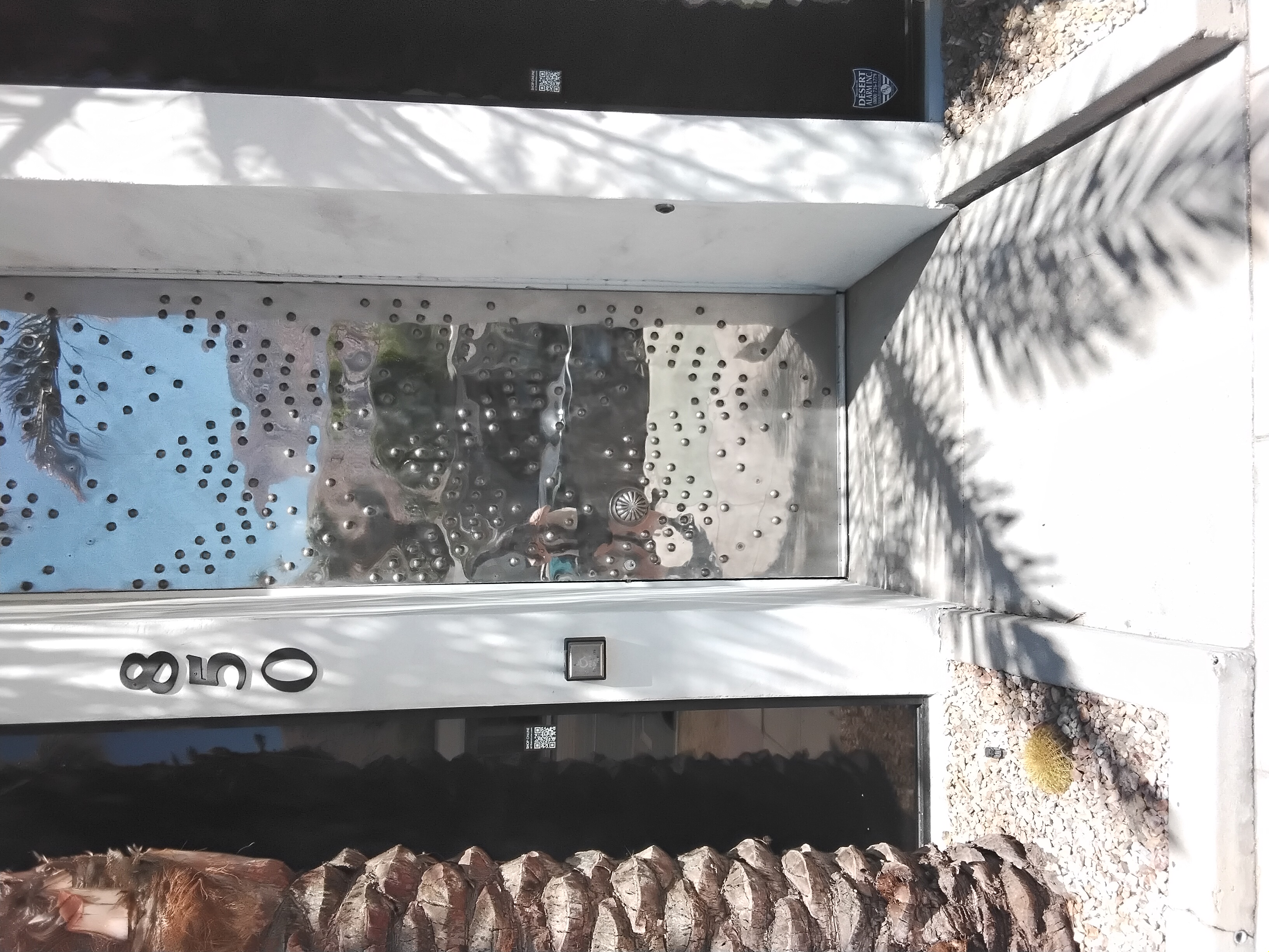 850 N Palm Canyon Drive — the original riveted entry door, Arthur Elrod Associates